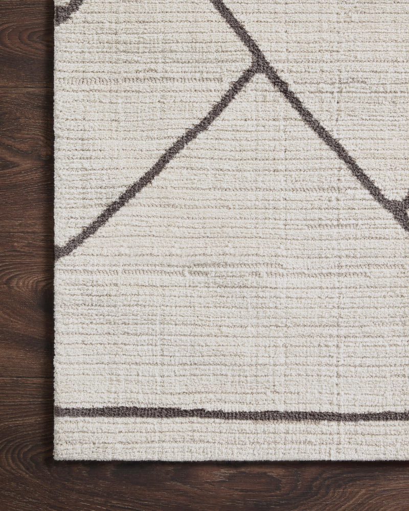 Magnolia Home by Joanna Gaines x Loloi Logan Rug in Ivory / Charcoal Ivory/White Accent Power-Loomed Polyester